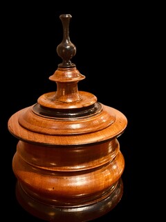 A 19th Century Walnut and Ebonised Tobacco Jar.