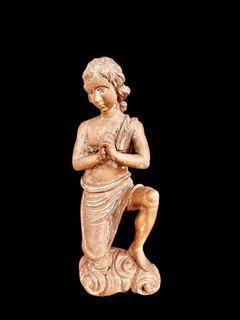A Carved Wooden Kneeling Angel ( Putto ) . Southern Europe. Circa 18th Century.