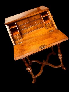 A Small English Queen Ann Style Burr Walnut Bureau.