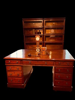 An English 19th Century Mahogany Partners Desk having a Beautiful Green Old Leather.