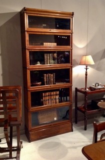 An English 19th Century Oak Globe Wernicke Bookcase