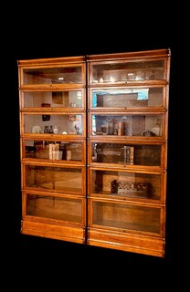 An English 19th Century Pair of Oak Globe Wernicke Bookcases. Six Sections High.