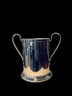 An English Antique Silverplated Bottle Holder.