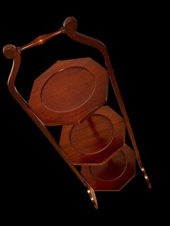 An English Early 20th Century Mahogany Folding Cake Stand.