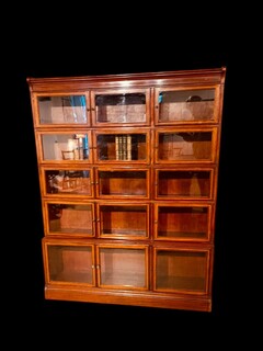 An English Early 20th Century mahogany sectional Bookcase by Minty of Oxford.