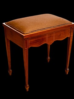 An English Edwardian Mahogany Piano Stool having Satinwood Inlay.