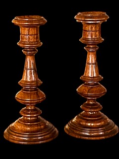 An English Pair of Early 19th Century Rosewood Candlesticks