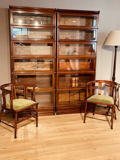 An English Pair of End 19th Century Mahogany Globe Wernicke Bookcases. Six Sections High.