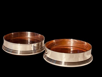 An English Pair of Sterling Silver Coasters. Stamped.